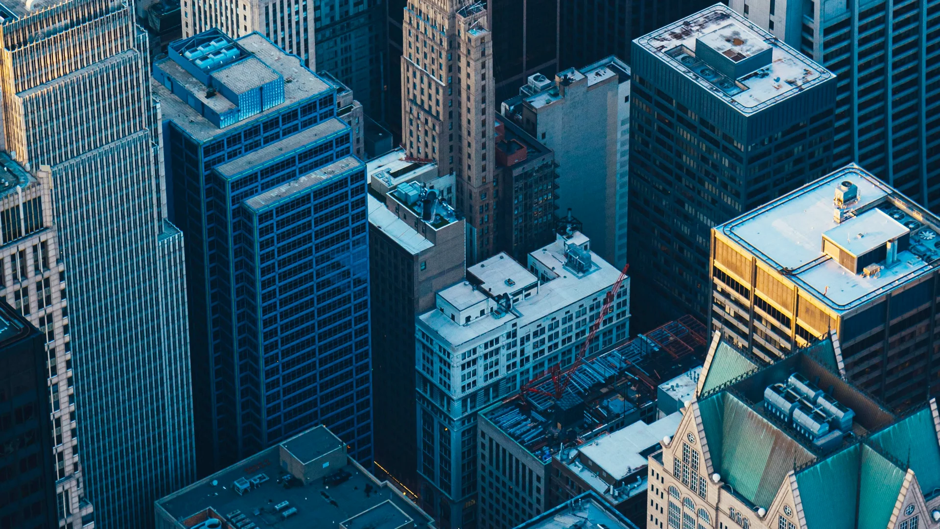Aerial view of a modern city, representing a thriving tech landscape